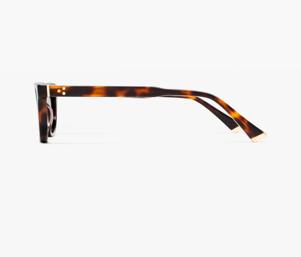 Side view of the Jimmy Fairly Pippa eyeglass frames in a butterfly tortoiseshell design, featuring straight temples and crafted from cellulose acetate, set against a white background.