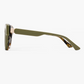 Side view of the Jimmy Fairly Paoli eyeglass frame in olive green cellulose acetate, featuring a thick rectangular arm and a light-colored metal hinge detail, set against a plain white background.
