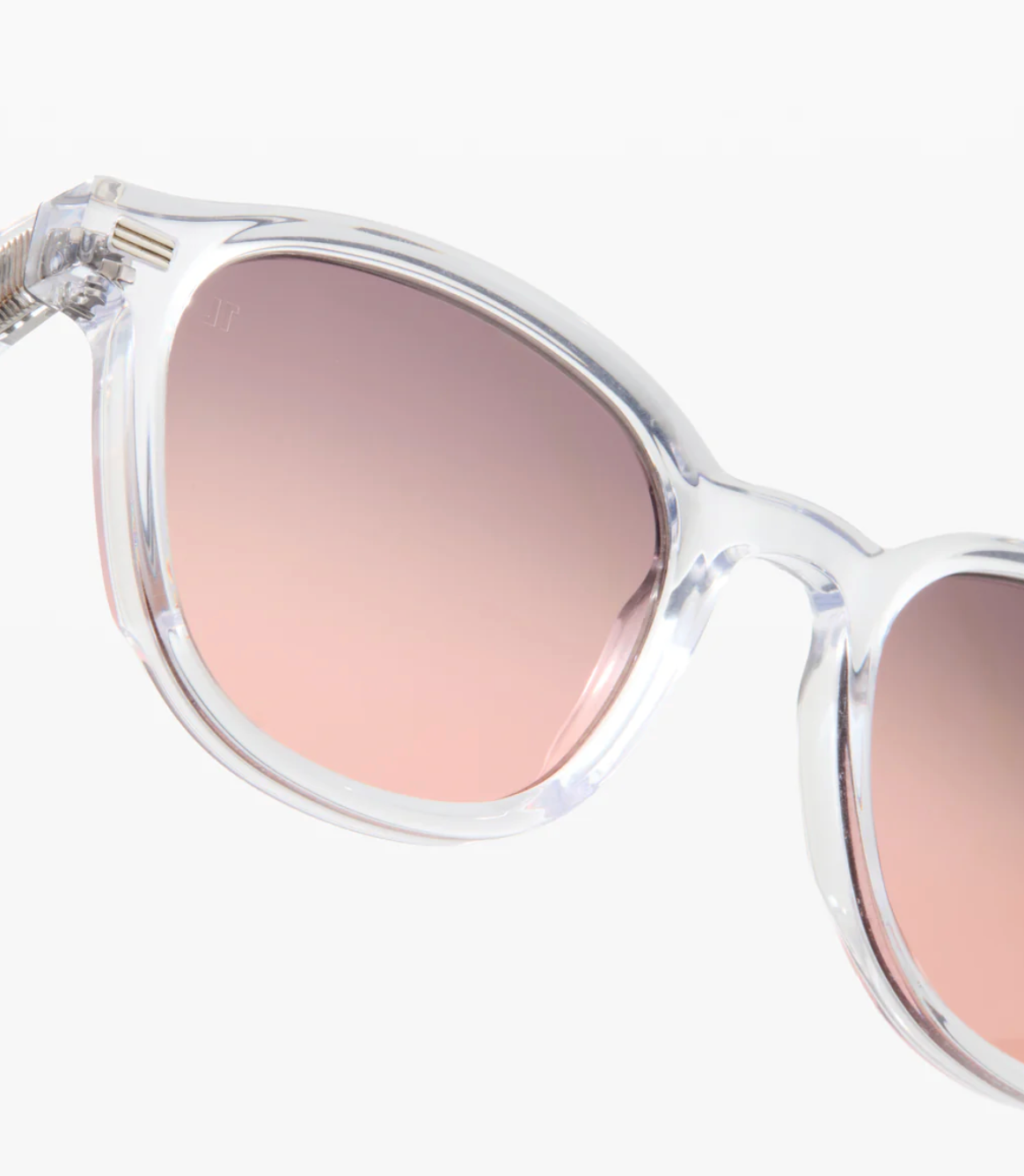 Close-up of the Adrian sunglasses by Jimmy Fairly, showcasing a square frame crafted from premium cellulose acetate and pink gradient lenses, with a 5-point metal hinge for added durability, set against a white background.
