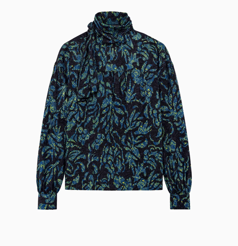 The Ulla Johnson Pastel Long Sleeve Cotton Blouse features a blue and green leaf pattern, a high ruched neck, gathered cuffs, and a structured silhouette, shown against a white background.