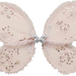 A pair of Noralee Wings in light pink, adorned with sequins and embroidered star patterns, featuring a silver butterfly at the center—a delightful costume accessory for imaginative play.