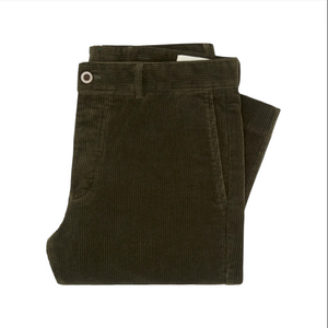 The Sid Mashburn Field Pant in dark olive green corduroy, neatly folded on a white background.