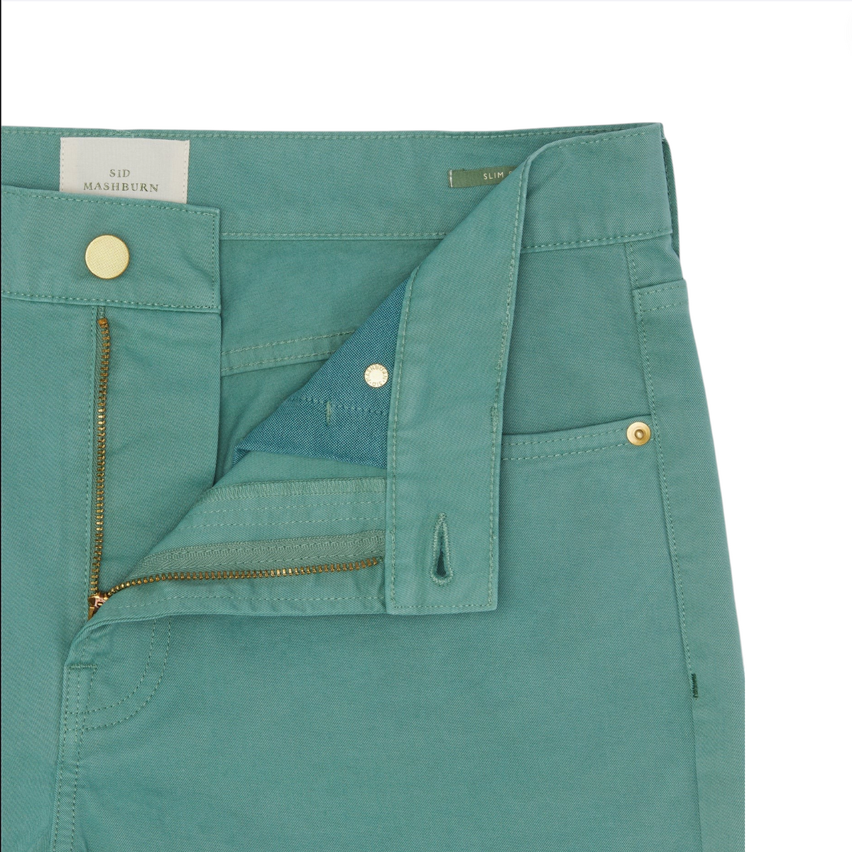 The Sid Mashburn Slim Straight 5-Pocket Pant in teal features garment-dyed Italian twill, a zipper fly that is partially open, a gold button closure, and a visible Sid Mashburn label on the waistband.