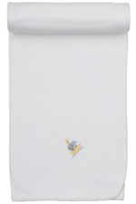 The Kissy Kissy Premier Noah’s Journey Blanket is crafted from white Pima cotton with scalloped edges, rolled at the top, and features a small embroidered gray mouse on a yellow wedge of cheese near the bottom center, offering an irresistibly soft touch for your little one.