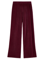 Suzie Kondi Zephyra Velour Pants in deep burgundy with a high-waisted, wide-leg fit and an elastic waistband.