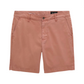 A pair of dusty rose AG Jeans Wanderer Shorts with a slim, trouser-style fit and an 8.5-inch inseam, featuring a button closure, zip fly, and standard pockets, displayed against a white background for a refined, tailored look.