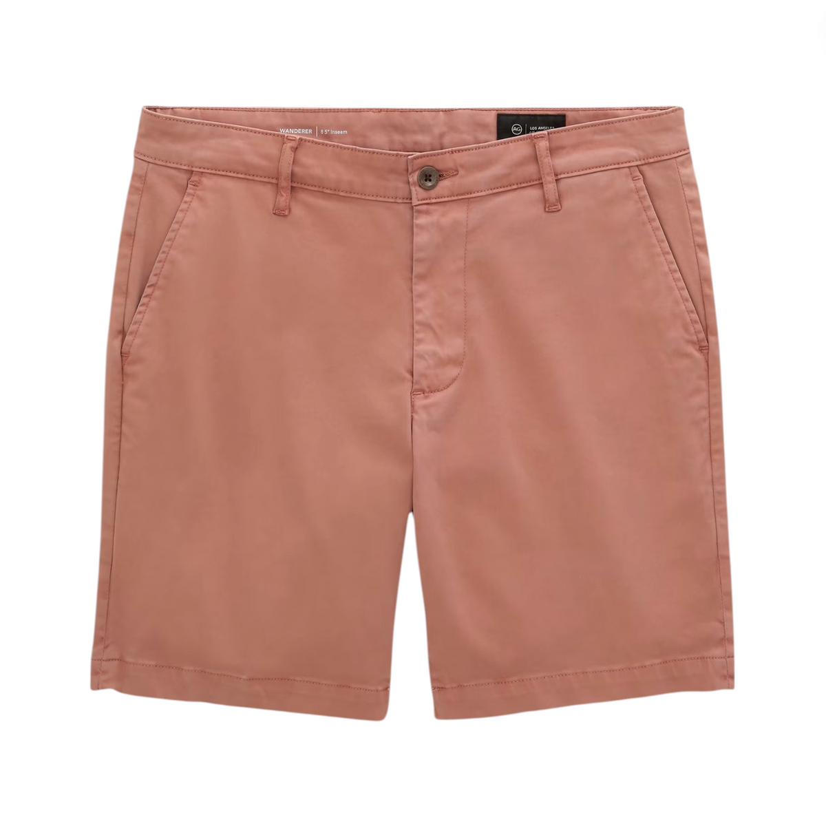 A pair of dusty rose AG Jeans Wanderer Shorts with a slim, trouser-style fit and an 8.5-inch inseam, featuring a button closure, zip fly, and standard pockets, displayed against a white background for a refined, tailored look.
