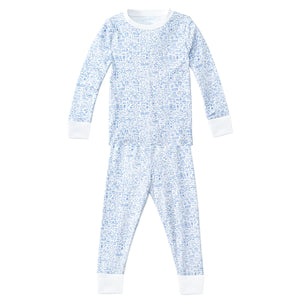 The Joy Street Baby Seaside Two Piece Pajama features long sleeves and pants with a light blue and white Seaside print and white cuffs. Perfect for cozy nights inspired by summer traditions.