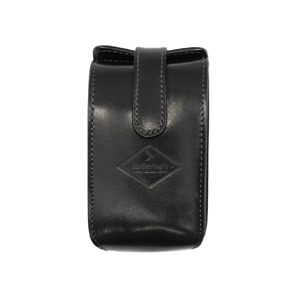 The Barberino's Travel Set is a black leather pouch with visible stitching, a flap closure, and an embossed logo—ideal for storing luxury grooming essentials or your travel shaving set.