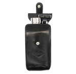 Barberino's Travel Set: black leather case with snap closure, includes a travel razor and metal container, displayed open against a plain background.