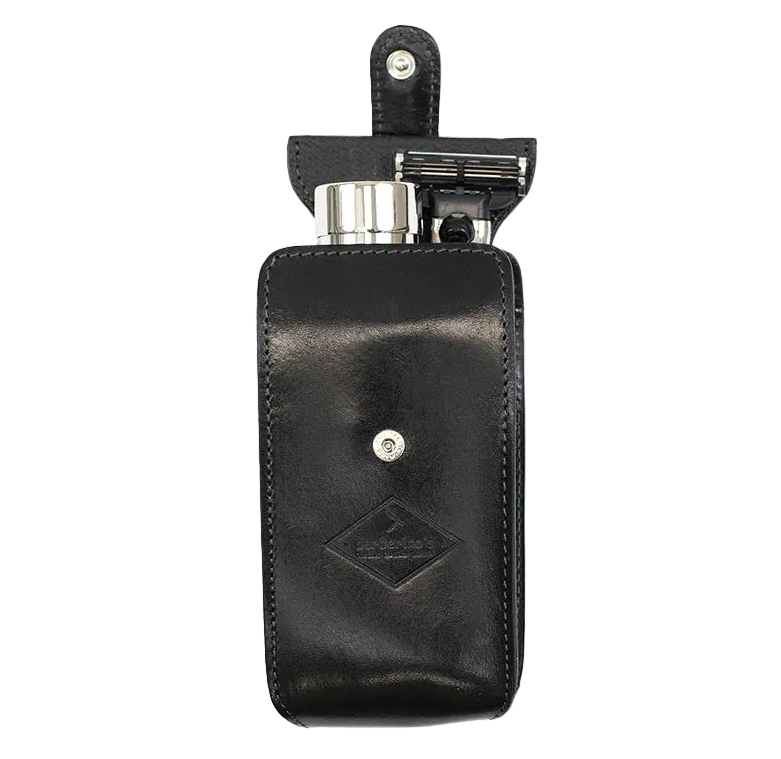 Barberino's Travel Set: black leather case with snap closure, includes a travel razor and metal container, displayed open against a plain background.