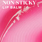 Close-up of Supergoop Glow Gloss Lip Balm SPF 40 with a shiny texture. Text on image reads, "Glossy lip balm for ultra-hydrated lips. High-shine, non-sticky finish in Pink Peppermint sheer candy pink tint.