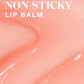 Close-up of Supergoop Glow Gloss Lip Balm SPF 40 in light pink: "High-shine, non-sticky finish. Vanilla Soft Serve shade gives a sheer soft pink tint and ultra-hydrated lips.