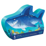 Dive into the colorful ocean realm with Crocodile Creek's Shark Reef 36 Piece Puzzle. This jigsaw for kids showcases a captivating illustration of a shark amidst vibrant marine life, providing an engaging and educational experience with every piece.