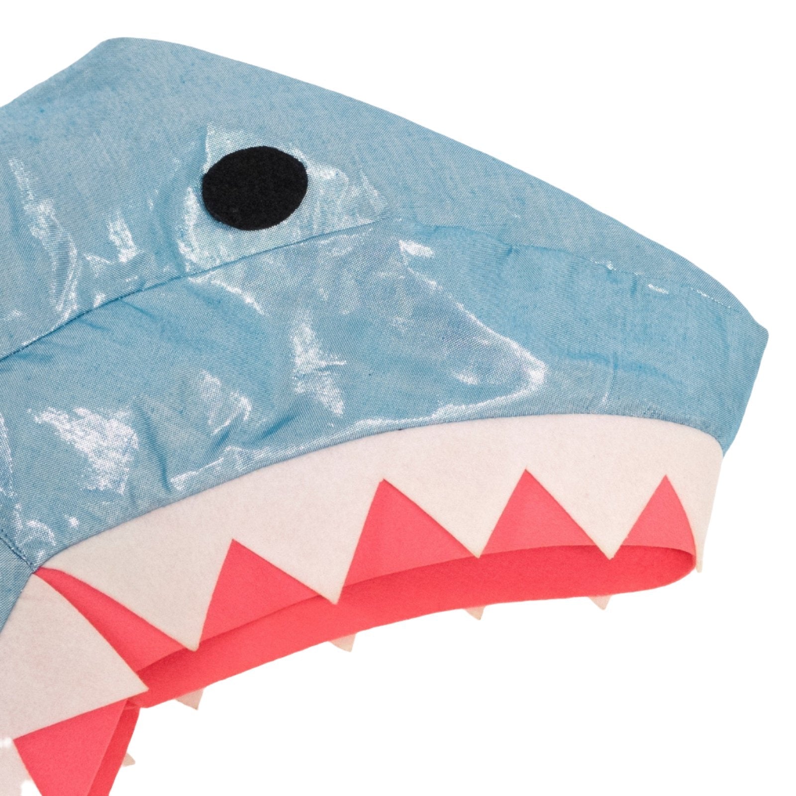 Close-up of the Meri Meri Shark Cape Dress Up by Meri Meri, featuring a blue shark head with white and red triangular teeth, a black circular eye, and a shimmering metallic cape that adds an extra touch of sea creature magic.