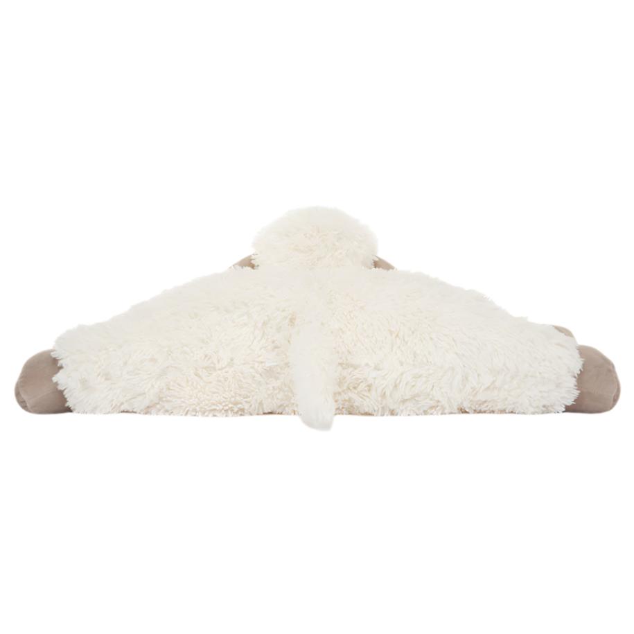 A plush, white, fuzzy dog bed with a tan base and a tail-like appendage sticking out from the center, perfect for any Jellycat Truffles Sheep to snuggle in.