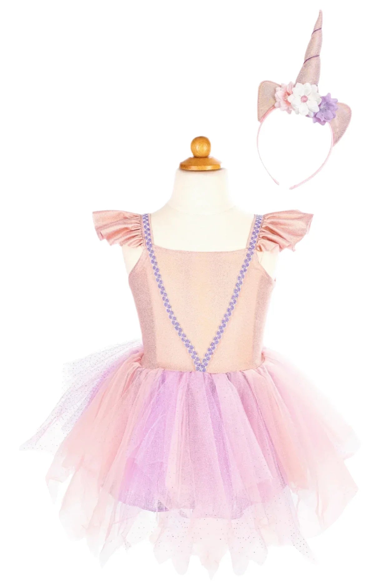 Displayed on a mannequin is the Great Pretenders Shimmer Unicorn Dress & Headband, which consists of a pink and purple unicorn-themed dress with a tulle skirt, complemented by a matching headband.