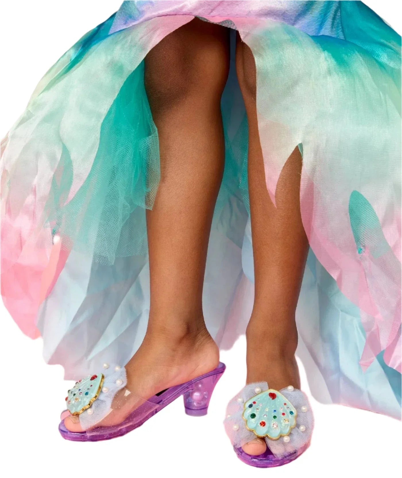 A child wears Super Smalls' Mermaid Dreams Play Shoes—pastel, flowing, and adorned with translucent purple gem seashells—for magical mermaid dress-up adventures.