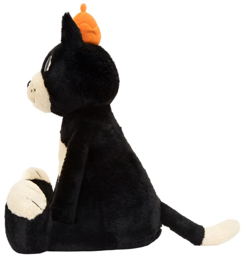 Jellycat's Jack Really Big plush, standing at 33 inches, resembles a tuxedo cat sitting gracefully with its front paws raised. This charming toy is elegantly adorned with a small orange hat, exuding both elegance and whimsy.