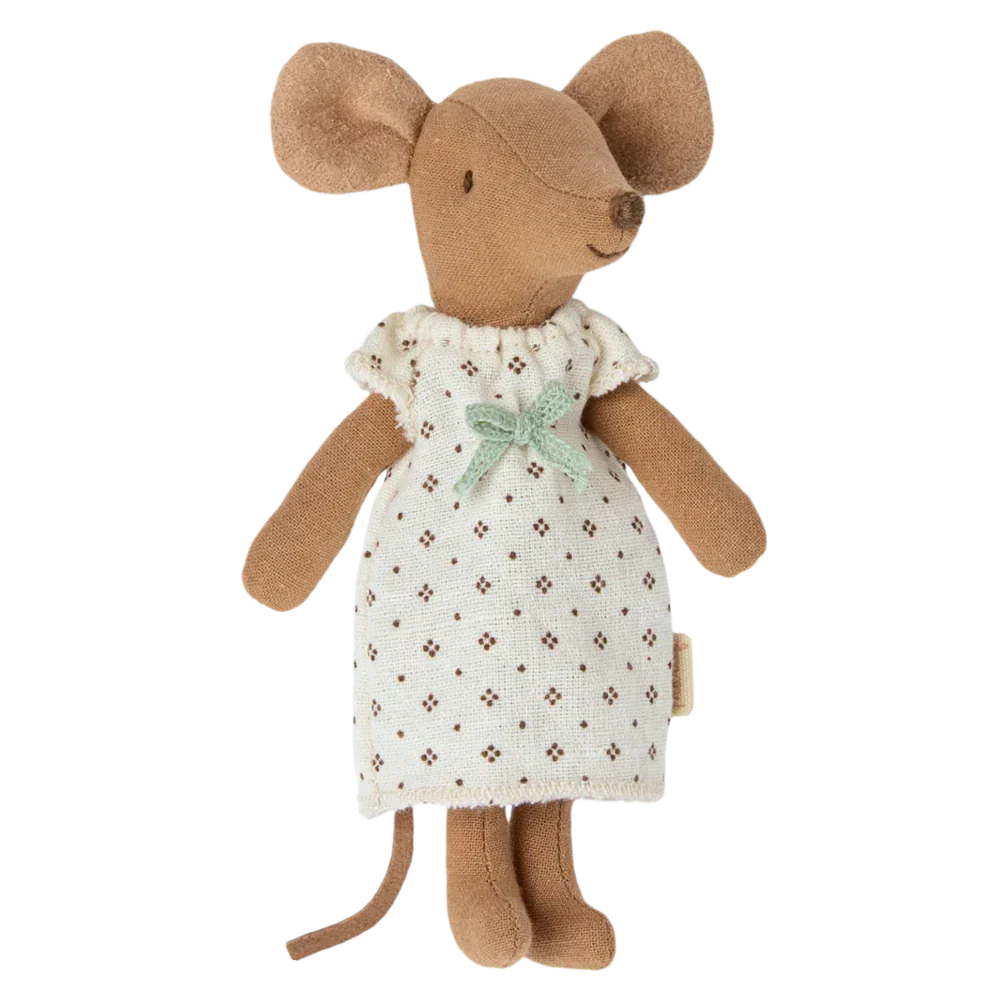 Introducing the Maileg Big Sister Mouse in Box - Nightgown, a charming toy from Maileg. This delightful stuffed mouse is dressed in a cute white dress adorned with small floral patterns and a green bow. Perfect for whimsical play, it even comes with its own matchbox bed for cozy nights of imaginative fun.