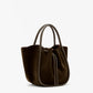The Small Ruched Soft Suede Tote by Proenza Schouler is a dark brown bucket-style bag crafted from soft suede, featuring dual rounded handles and a drawstring closure for a sculptural silhouette, shown against a plain white background.