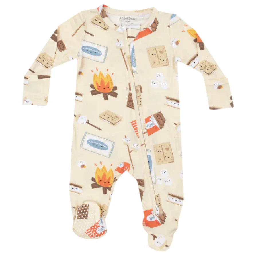 The Angel Dear Smores 2-Way Zip Footie is a beige baby onesie made from soft bamboo fiber fabric, featuring Angel Dear's signature camping-themed prints such as campfires, s'mores, and fish.