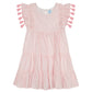 The Mer Girls' Sophie Tassel Dress showcases a pink and white pattern, ruffled sleeves, scoop neckline, tassel trim, and a tiered skirt, all displayed against a plain white background.