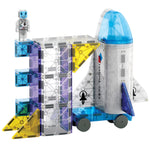 The Magnatiles Space 32-Piece Set features translucent pieces to build a rocket ship, launch tower, and platform with a figure—an inspiring STEAM toy for imaginative play.