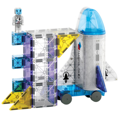 The Magnatiles Space 32-Piece Set features translucent pieces to build a rocket ship, launch tower, and platform with a figure—an inspiring STEAM toy for imaginative play.