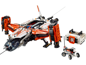 The LEGO® Heavy Cargo Spaceship from Legos - Toyhouse is a detailed set featuring large orange and white components, including a mini space rover with a small wheeled vehicle and control box. Perfect for space exploration enthusiasts, this collection combines intricate design with functionality.