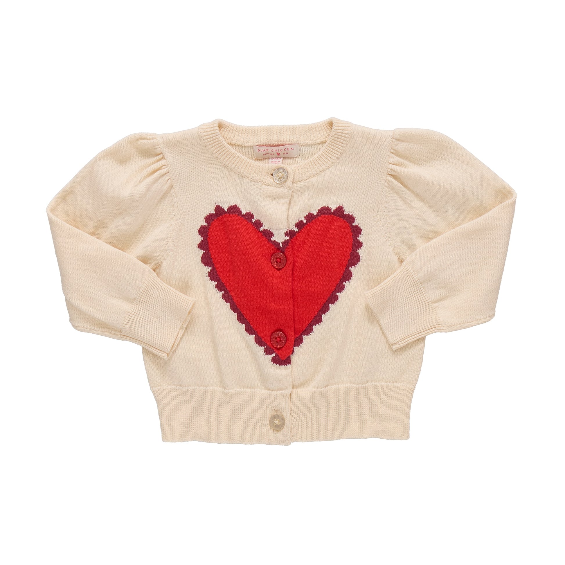 The Pink Chicken Baby Girls' Constance Sweater features long sleeves, front buttons, and a large red heart with scalloped edges—an adorable cream-colored Valentine’s Day sweater for your little one.