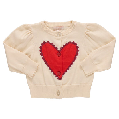 The Pink Chicken Girls' Constance Sweater is a cream cardigan with long sleeves, front buttons, and a large red heart on the chest—perfect for Valentine’s Day.