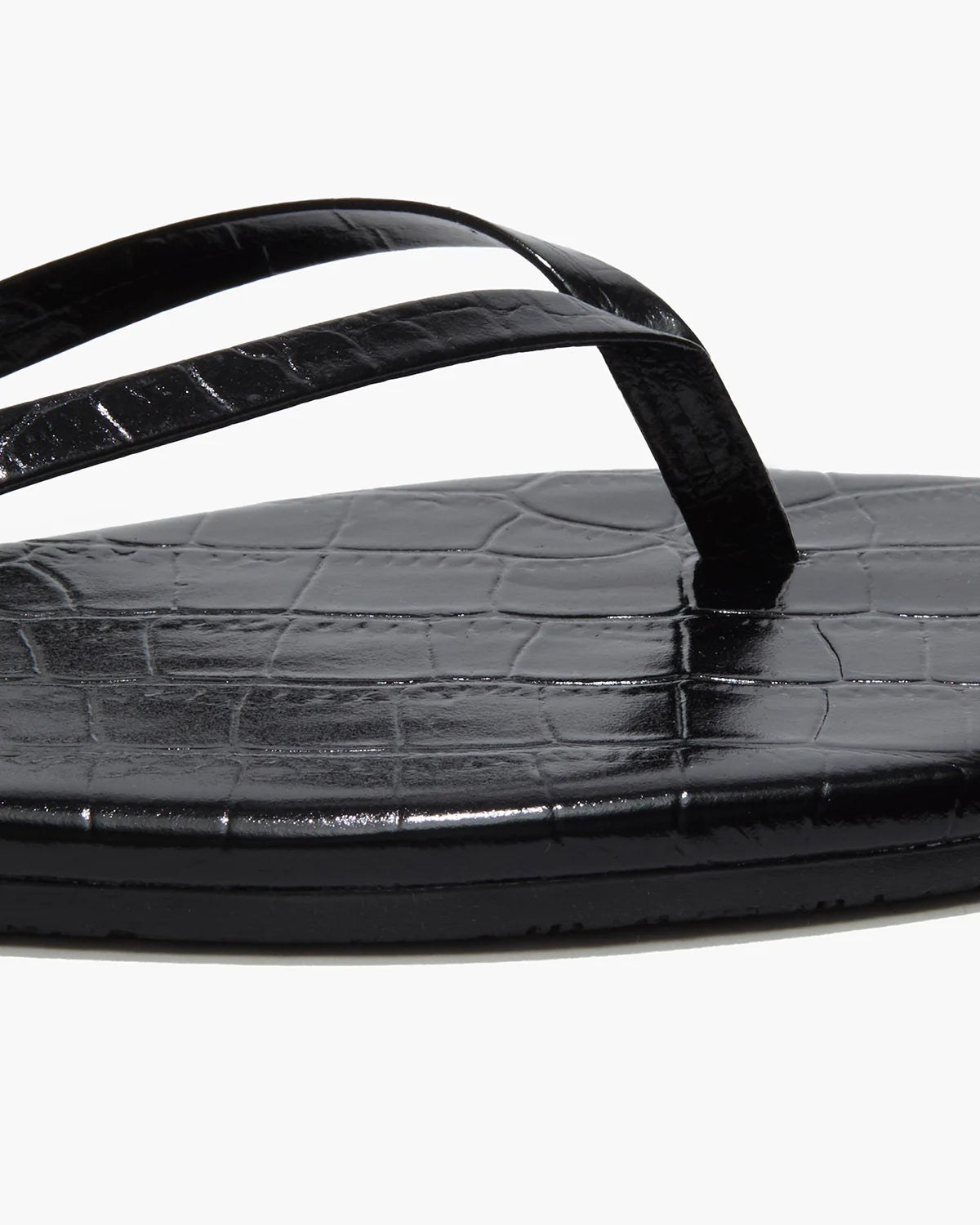 Close-up of the Tkees Lily Square Toe Croc Sandal in black, showcasing its square toe design, thin straps, and crocodile-embossed leather texture.