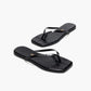 The Tkees Lily Square Toe Croc Sandal is a black, square-toe flip-flop with crocodile-embossed leather, shown on a white background.