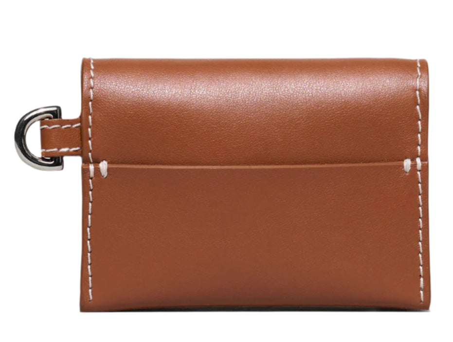 The Stella Wallet by Lie Studio is a compact, stylish brown wallet made from Italian cow leather with white stitching and a metal D-ring on the left side, pictured on a white background.