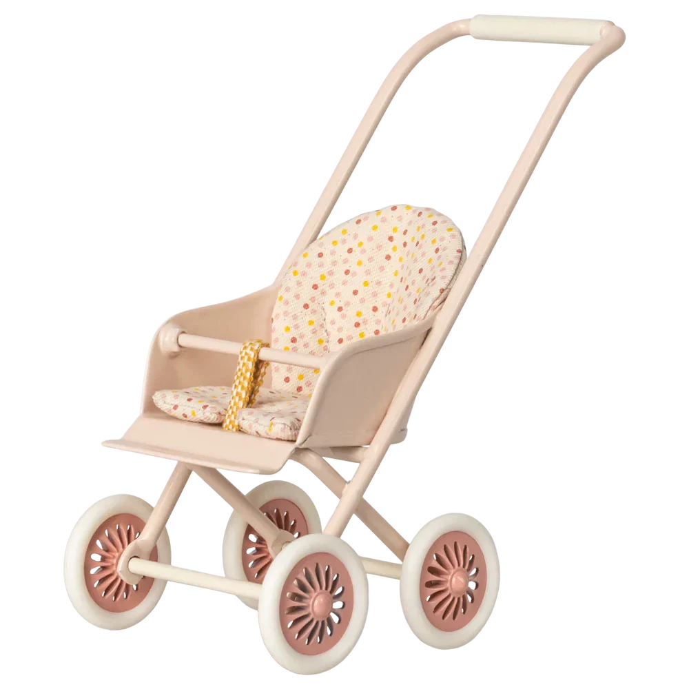 The Maileg Stroller, Micro - Powder features a beige frame, four pink wheels, a floral-patterned seat cushion, and a yellow strap—perfectly sized for your bunny plush toys and shown on a white background.