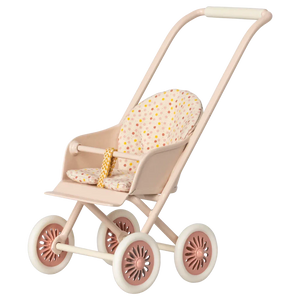 The Maileg Stroller, Micro - Powder features a beige frame, four pink wheels, a floral-patterned seat cushion, and a yellow strap—perfectly sized for your bunny plush toys and shown on a white background.