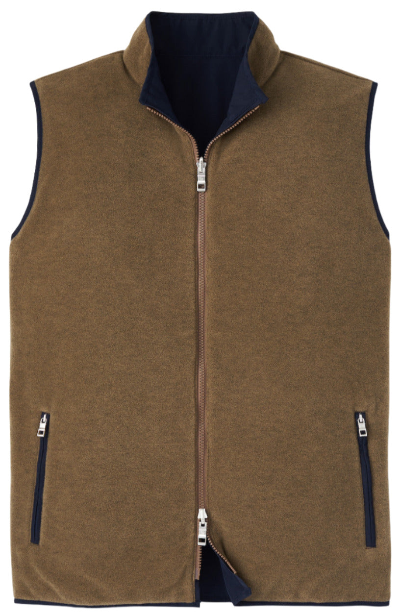 The Peter Millar Brentwood Reversible Fleece Vest showcases a brown, windproof design, complete with a full-length zipper, two side pockets, and a dark inner lining.