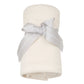 The Angel Dear Solid Sugar Swizzle Swaddle Blanket, presented in a cream hue and tied with a gray ribbon, features a versatile design ideal for any nursery.