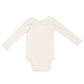 The Angel Dear Solid Sugar Swizzle Bodysuit, a beige long-sleeve baby bodysuit with a round neckline, is shown from the back. This comfortable wardrobe essential from Angel Dear is perfect for any little one's collection.