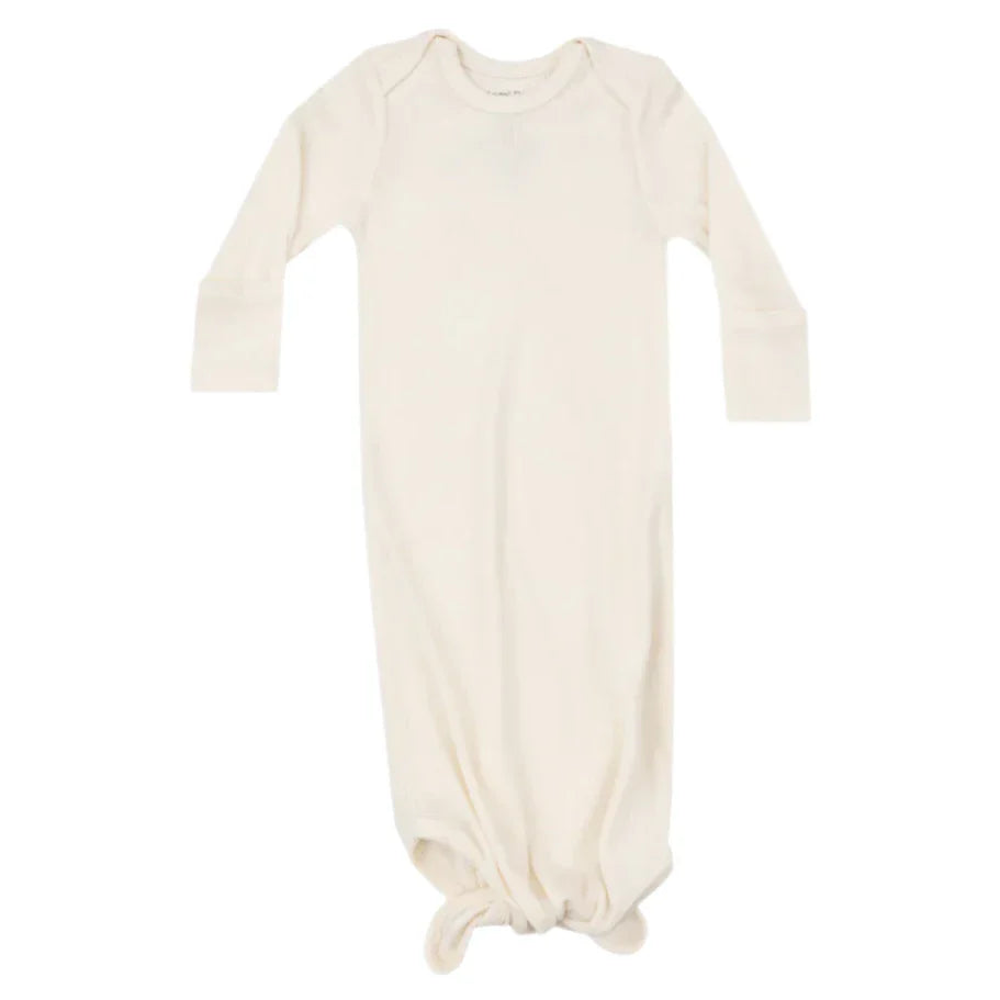 The Angel Dear Solid Sugar Swizzle Knotted Gown, from the renowned brand Angel Dear, is a cream-colored long-sleeve baby gown designed with a knotted bottom to make quick diaper changes effortless, while ensuring cozy and warm nights.