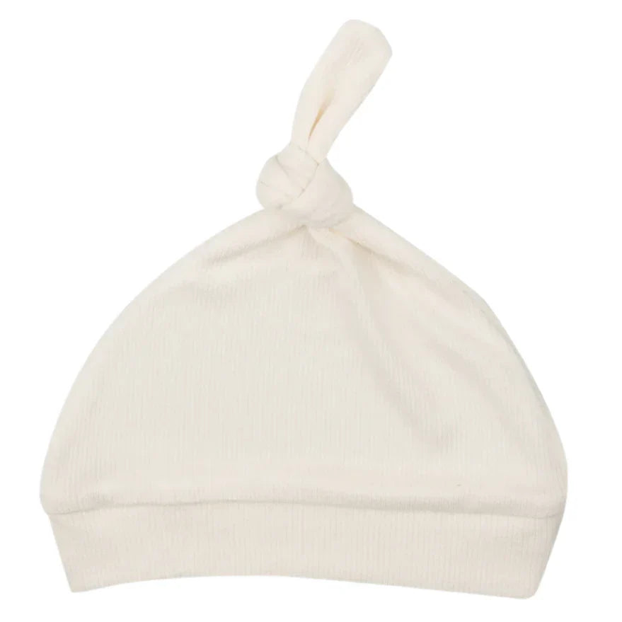 The Angel Dear Solid Sugar Swizzle Knotted Hat is a cream-colored baby hat with an adjustable knot for added comfort.