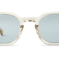 The Mr. Leight Rell Sunglasses showcase a nonconforming modern style with their clear, square frames and geometrical silhouette. The light blue Mr. Leight Select Glass lenses enhance their elegance, all beautifully set against a pristine white background.