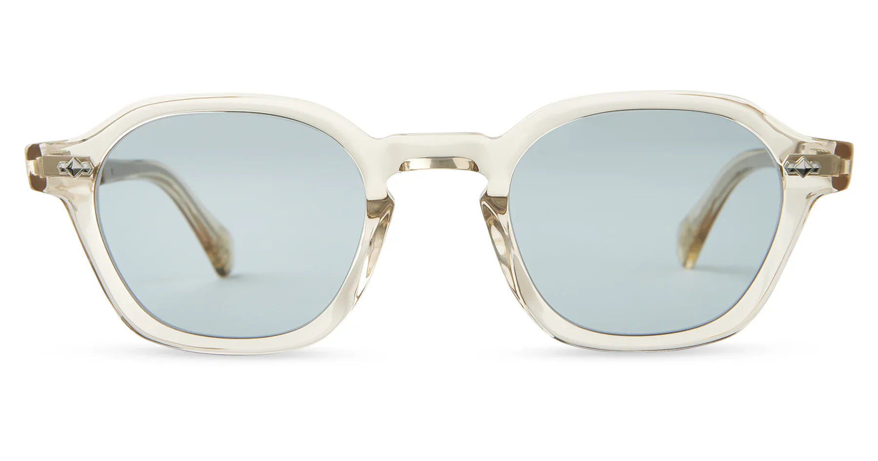 The Mr. Leight Rell Sunglasses showcase a nonconforming modern style with their clear, square frames and geometrical silhouette. The light blue Mr. Leight Select Glass lenses enhance their elegance, all beautifully set against a pristine white background.