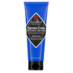 Jack Black Supreme Cream Triple Cushion Shave Lather, a 6 oz blue tube, enriched with macadamia nut oil and soy for a smooth shave and hydrated skin.