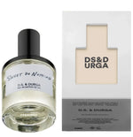 The D.S. & DURGA Sweet Do Nothing 50ML perfume bottle sits gracefully next to its white packaging, capturing the tranquil essence of blooming cacti.