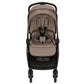 The Nuna SWIV Stroller by Nuna features a beige cushioned seat and a sturdy black frame. It offers enhanced stability with its four wheels, and the front ones include button-activated rotation for an effortless 360-degree swivel. The stroller also includes a 5-point harness, a front bumper bar, and a convenient storage basket underneath.