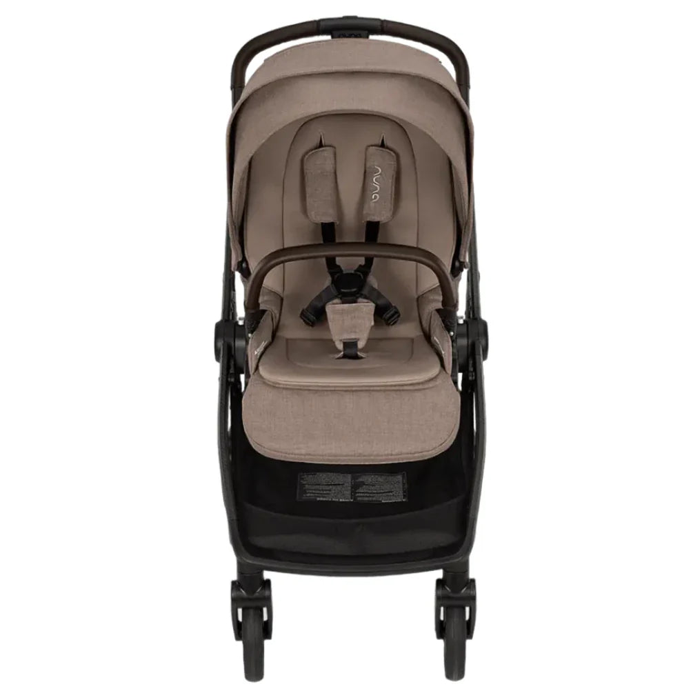 The Nuna SWIV Stroller by Nuna features a beige cushioned seat and a sturdy black frame. It offers enhanced stability with its four wheels, and the front ones include button-activated rotation for an effortless 360-degree swivel. The stroller also includes a 5-point harness, a front bumper bar, and a convenient storage basket underneath.