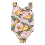 Pink Chicken Girls' Sylvie Bow One-piece: Pink tropical swimsuit with banana and green leaf print, ruffle trim sleeves, and three pink bows on the front.