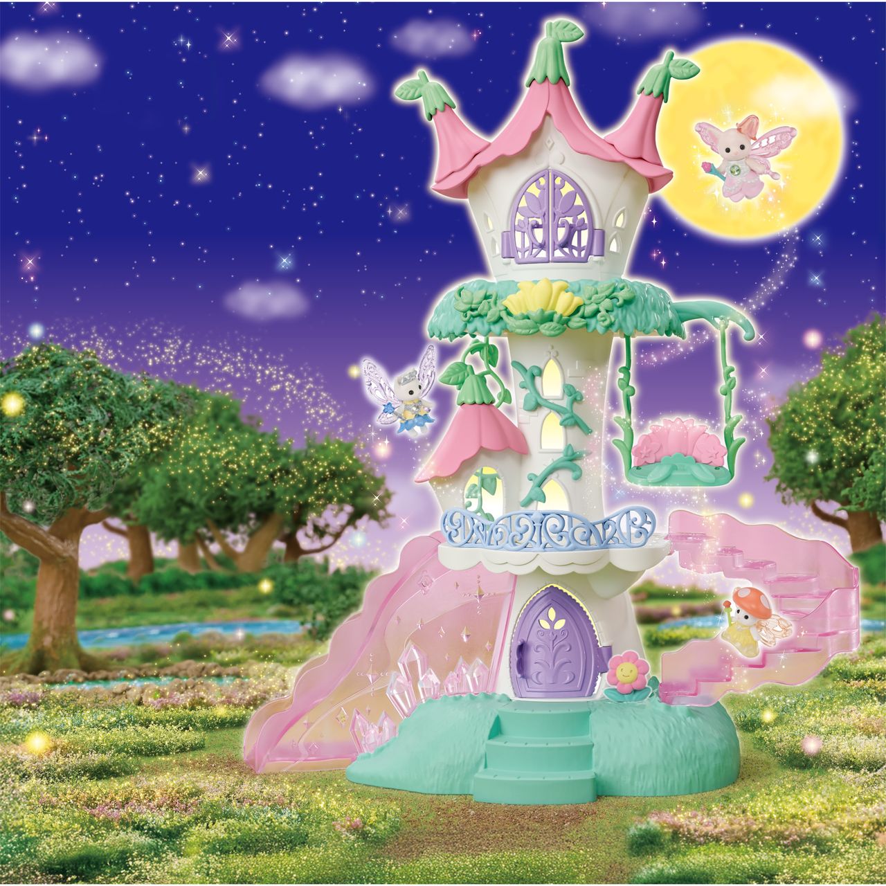 A whimsical, pastel-colored Calico Critters Fairytale Tower stands in a glowing, magical meadow at night, adorned with flower-themed furniture. Three fairies—including a radiant Nectar Fairy—flutter beneath the full moon in the starry sky.
